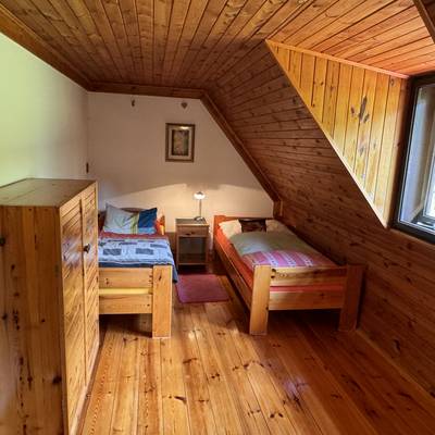 Prodej nemovitosti s panoramatickým výhledem na Lipenskou přehradu se stavebními pozemky.