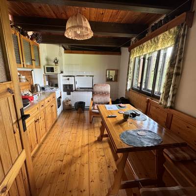 Prodej nemovitosti s panoramatickým výhledem na Lipenskou přehradu se stavebními pozemky.