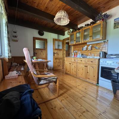 Prodej nemovitosti s panoramatickým výhledem na Lipenskou přehradu se stavebními pozemky.